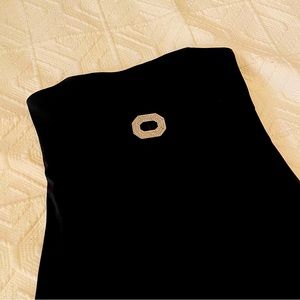 Black strapless cocktail dress.  rhinestone detail in middle of bust. Worn 1x